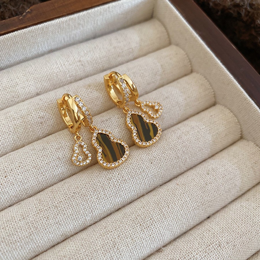 Pendientes de ojo de tigre artificial de color café Maillard con aguja de plata Pendientes simples y de moda de todo fósforo Pendientes ligeros de lujo de alta gama