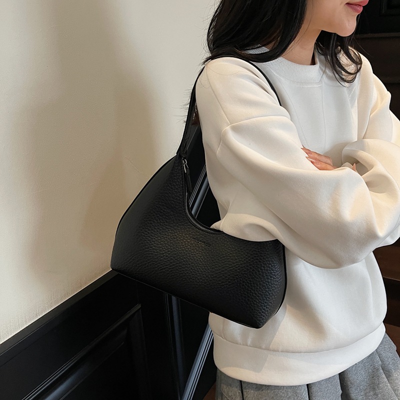 Cross-border 2025 otoño y invierno nuevo nicho litchi estampado bolso de hombro bolso de brazo de moda bolso de mano de viaje