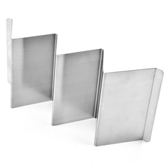 Stainless steel Mexican thin pancake stand W-shaped griddle with 430 corn tortillas placed on a taco holder tool