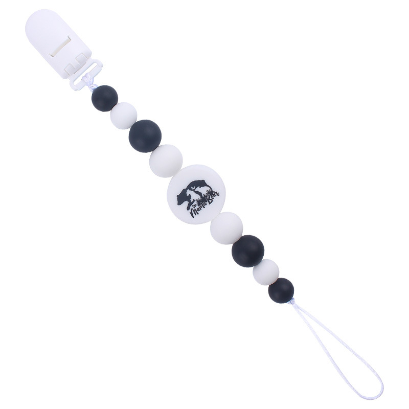 Nuevo bebé suministros de dibujos animados de impresión redonda amor creativo DIY silicona mordedura molar pezón cadena anti-caída