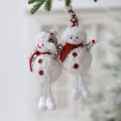 木の新商品を探してクロスボーダーの現物のクリスマスツリーを飾って天使のクリスマスのぬいぐるみの雪だるまの子供を飾ります。