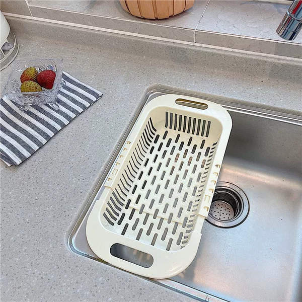 Beige sink draining basket
