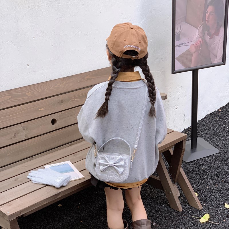 Dulce pequeño fresco bolso de hombro infantil lindo arco de color sólido bolso para padres e hijos nuevo bolso de accesorios para niñas