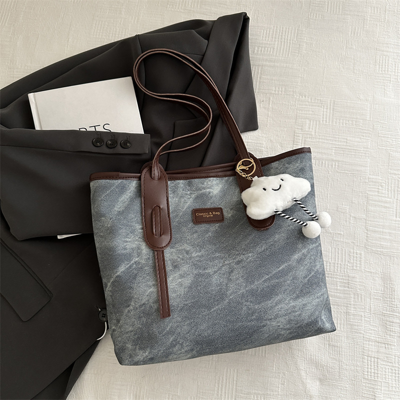Bolso retro de gran capacidad para mujeres 2024 nueva moda textura bolso de hombro simple empalme bolso de viaje