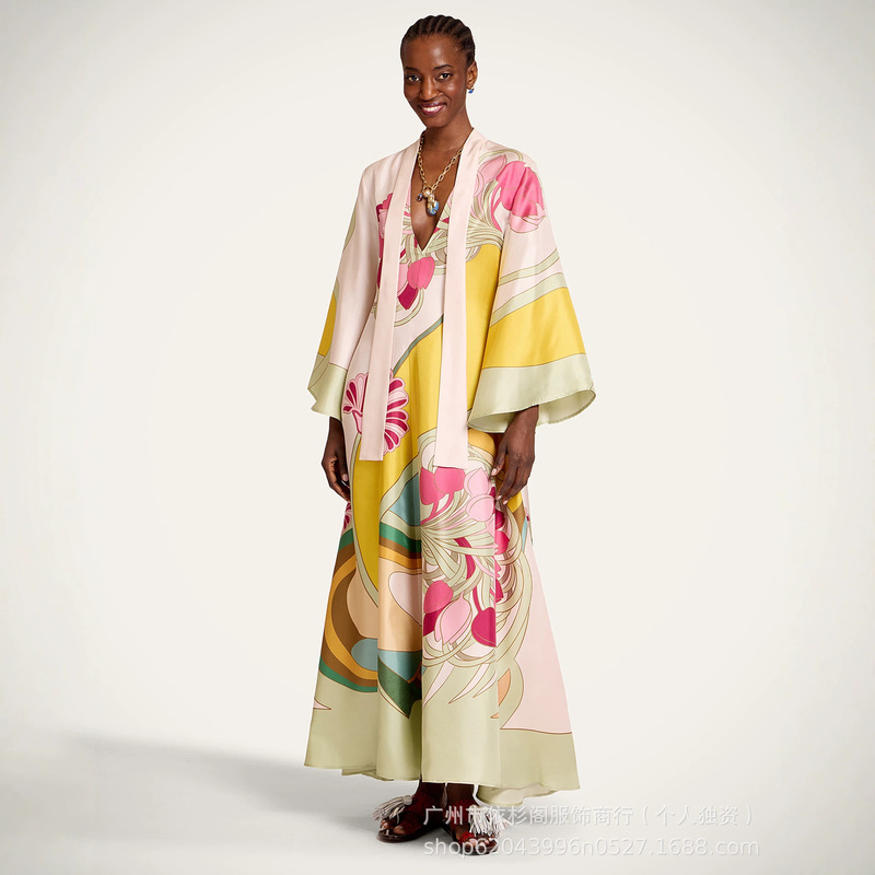2026 European and American Summer New Satin Printed Halter Neck Long Dress, Vacation Style, Elegant and Slimming, Large Hem Dress for Women 2026 European and American Summer New Satin Printed Halter Neck Long Dress, Vacation Style, Elegant and Slimming, Large Hem Dress for Women