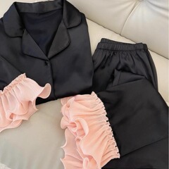 2024春秋の氷雪のパジャマの女性の2つのセットの純色の黒色の高級感のスーツの家庭服は外で着ることができます。