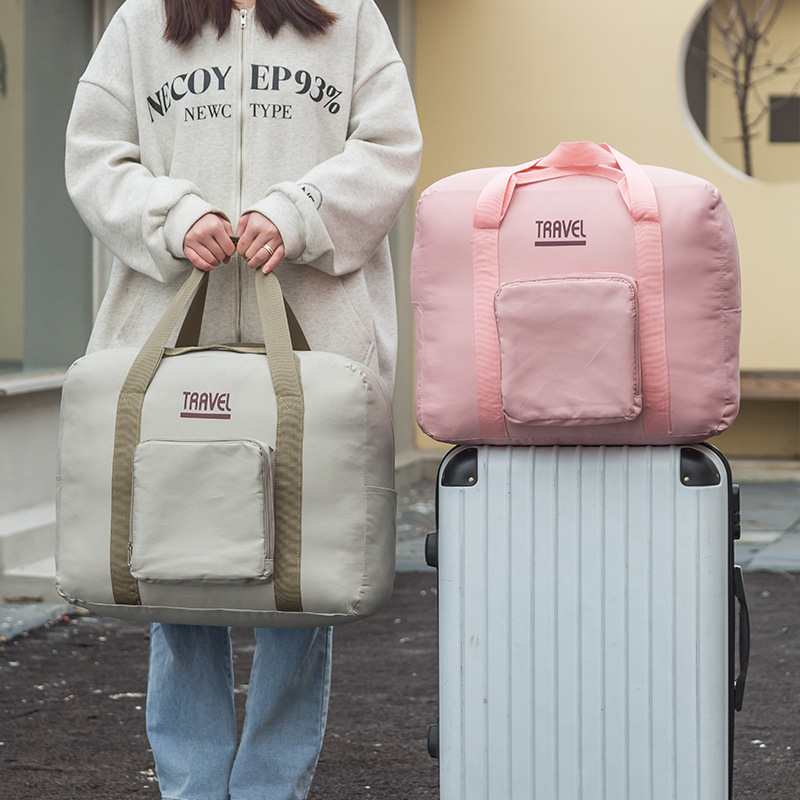 2023 primavera viaje de viaje bolsa de almacenamiento de doble capa impermeable engrosada carro Portátil Bolsa de hombro viaje de larga distancia bolso