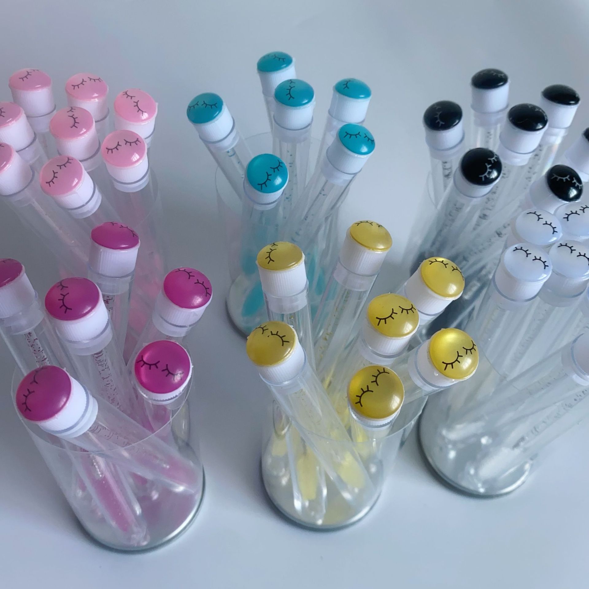 Wholesale smiley face tube mascara brushes with rhinestones, disposable crystal handle mascara brushes, eyebrow combs, eyelash extension makeup tools