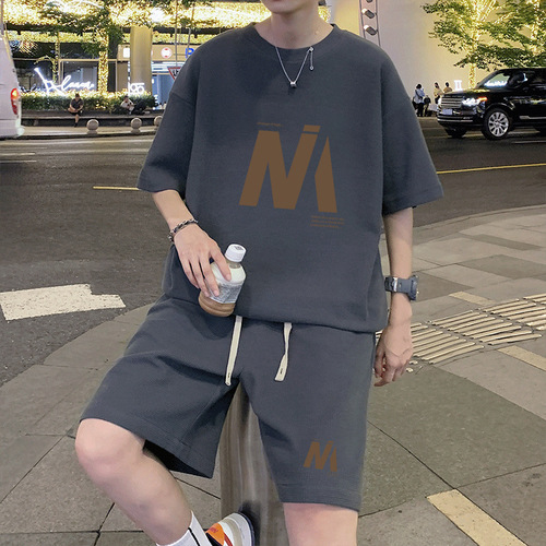 Stylish and handsome honeycomb casual summer short-sleeved T-shirt trend plus-size loose sports shorts two-piece set