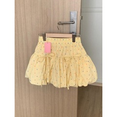 甘いカラーの波の点の花のつぼみのスカートの半身のスカート