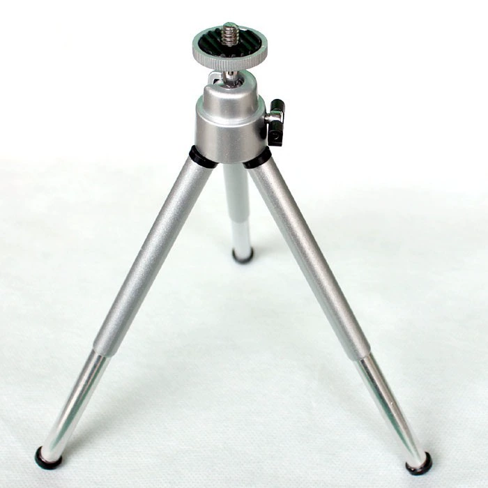 Small handheld tripod, digital CCTV camera, phone holder, projector, clips included