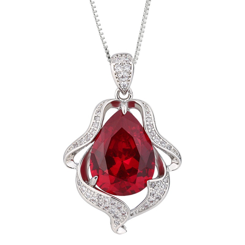 Otoño e invierno nuevo Zhuang Sheng joyería cobre inferior chapado en oro simulación rojo corindón retro gota de agua traje femenino 12*16-8*12