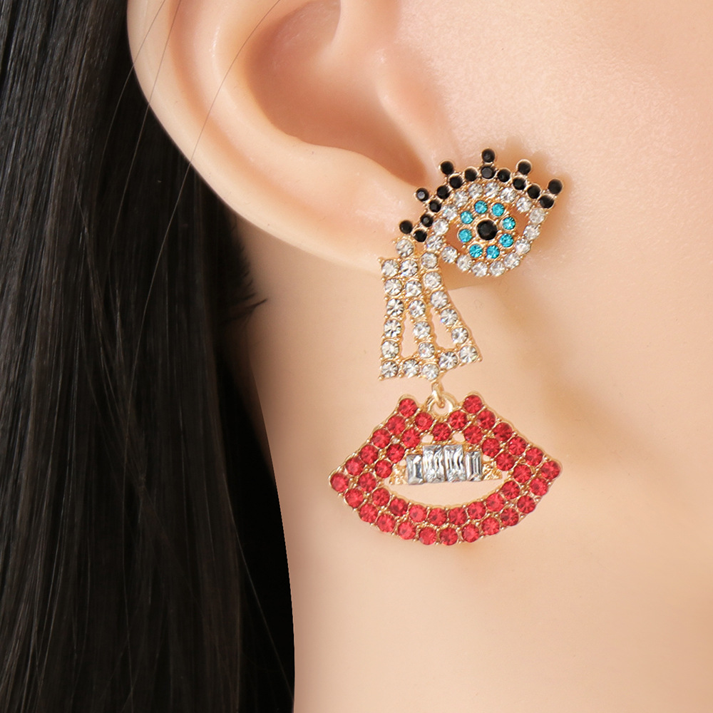 Fashion asymmetrical eyes lips alloy earrings wholesale