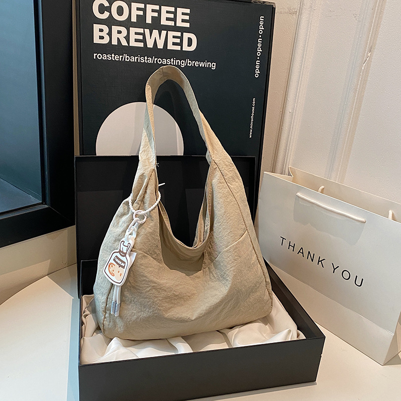 Bolsa de lona coreana ins2024 verano nueva moda ocio bolso de hombro para estudiantes universitarios