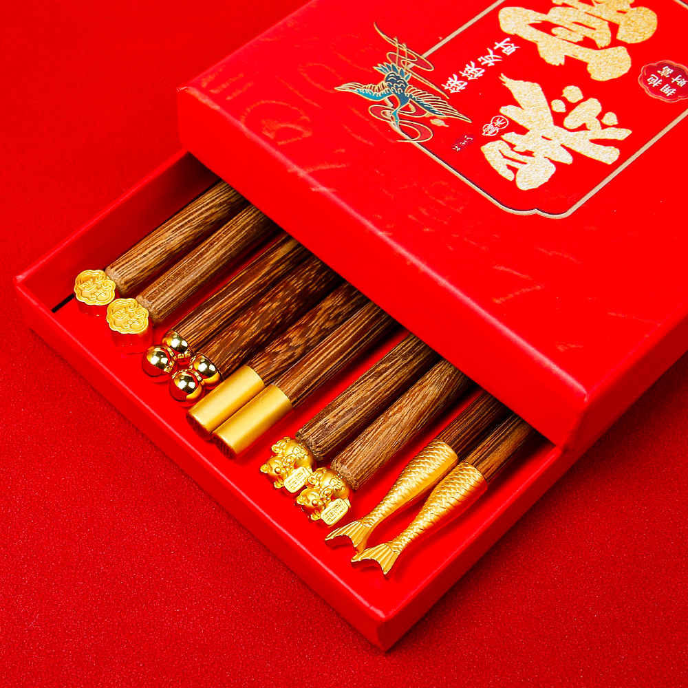 Palillos de Año Nuevo Palillos de madera de ala de pollo Palillos de madera maciza sin pintura y sin cera Comidas domésticas Una persona, una persona, palillos, caja de regalo para la riqueza