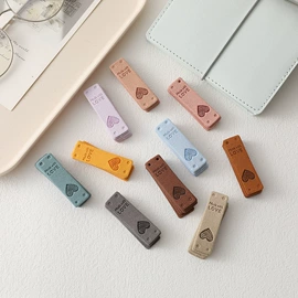 布贴;洗唛、商标;服装饰品