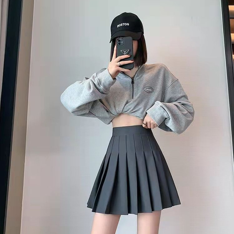 Váy xếp ly màu trơn cho nữ váy nửa người kết hợp tất cả các kết hợp váy ngắn cạp cao chống lộ màu đen ôm dáng váy chữ a thon gọn bán buôn