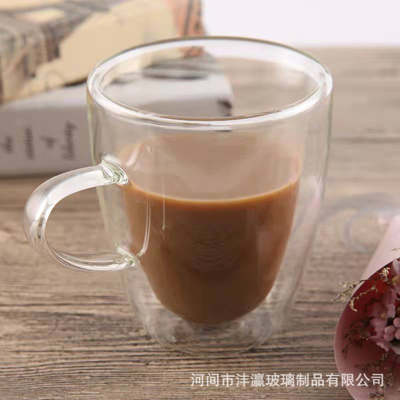 Taza de vidrio de doble capa de aislamiento térmico Taza de agua de vidrio transparente de leche con asa doméstica Taza de café de oreja plana fabricante al por mayor
