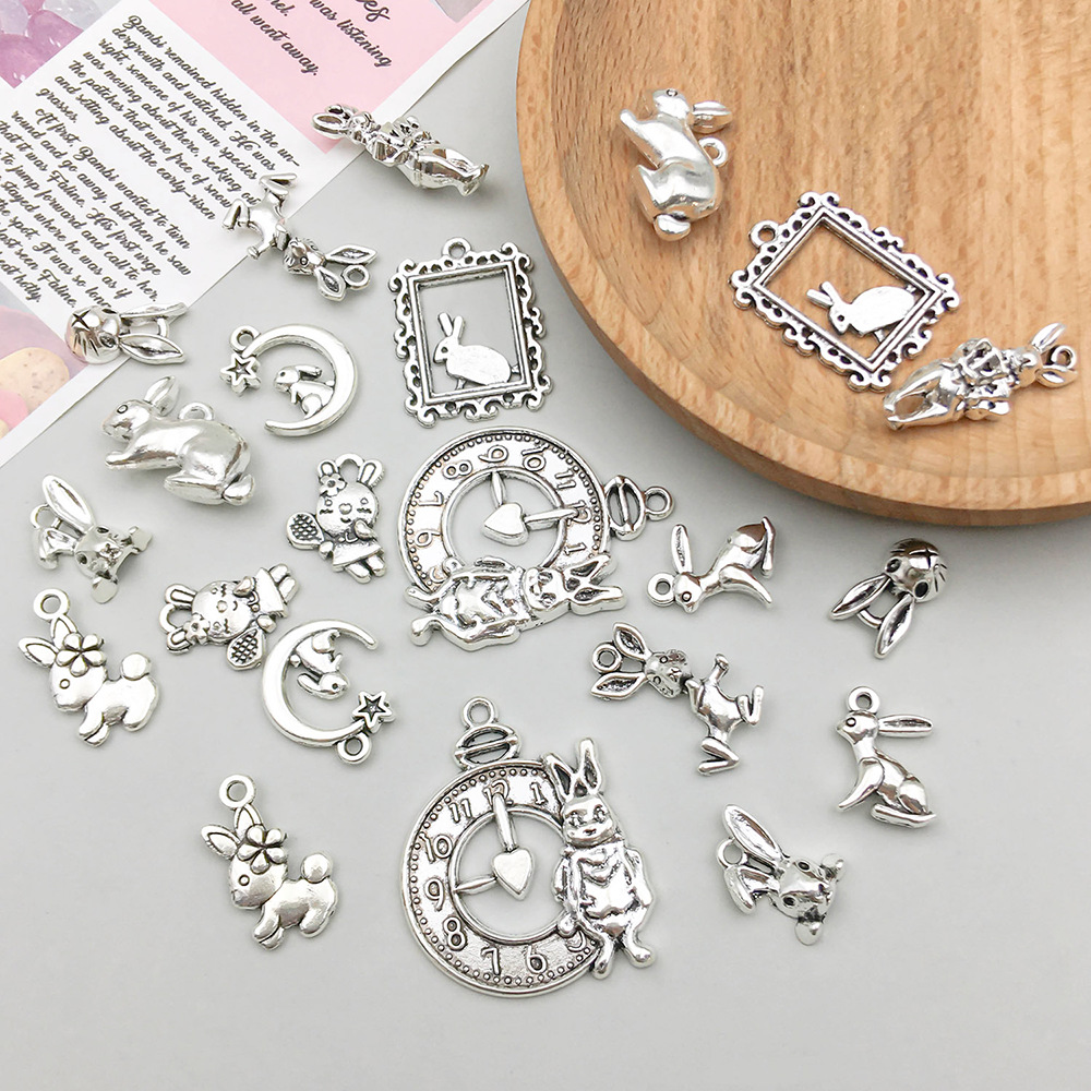 2g Weight Pendant Jewelry Making Type 17*24mm Jewelry Making Size DIY Jewelry Accessories Classification 11 Models, 2 Each, 22/Bag Quantity Zinc alloy Material Rabbit Pattern Polished Finish Plating Design Cute Style 11 Models, 2 Each, 22/Bag 17*24mm Zinc Alloy Rabbit Polished Pendant 8