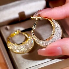 クロスボーダーの網状の水晶の金属のイヤリングの女性の高級感のネットの赤い同型の丸い耳飾りの独特な設計の気質の耳のボタン