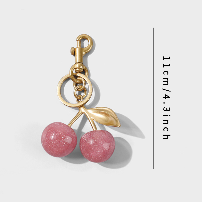 Transfronterizos directamente para bolsas de cereza colgantes de moda llaveras de automóviles llaveras de Amazon llaveras de metal accesorios de bolsas al por mayor