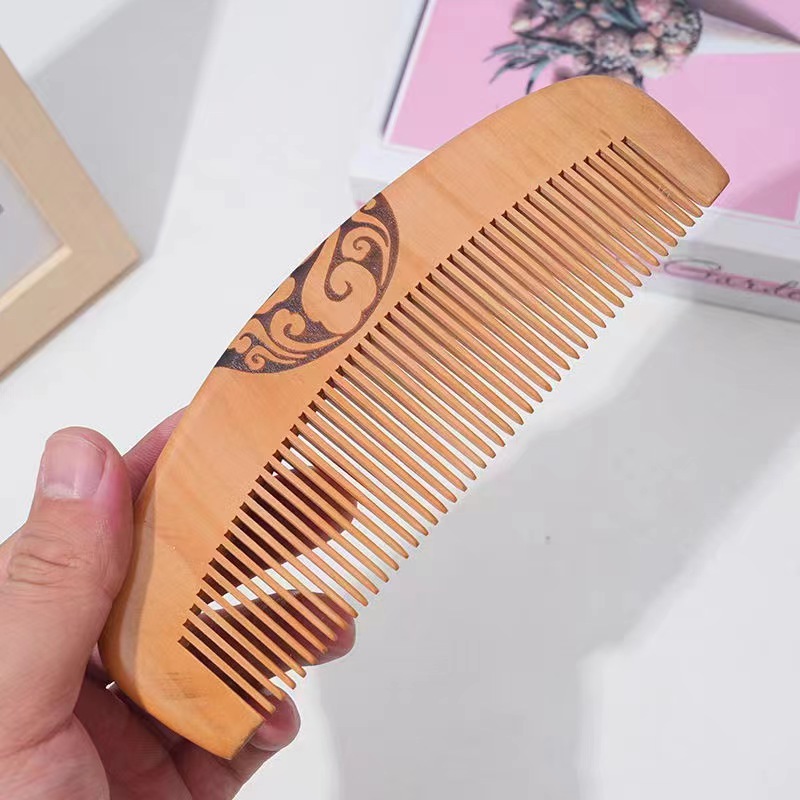 Peine de melocotón fábrica al por mayor engrosada densa peine de dientes de gran hogar antiestático peine de melocotón de regalo para el Día del Maestro