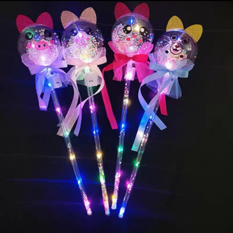 Bola de estrellas en la oreja del gato