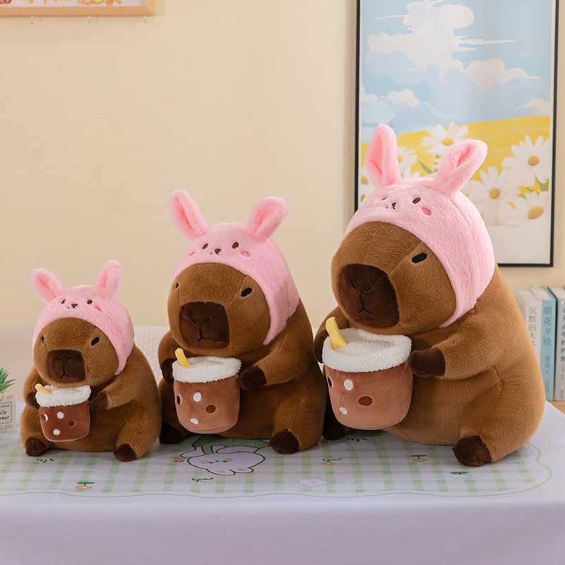 La explosión de celebridades de Internet se transforma en un abrazo de flores y un abrazo de té con leche Kapibala, muñeco de peluche, regalo de almohada para niños