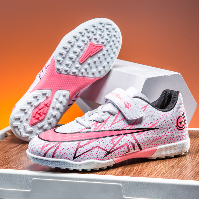 Zapatos de fútbol transfronterizos de alto perfil para hombres TF zapatos de entrenamiento antideslizante transpirables para niños zapatos deportivos profesionales para estudiantes