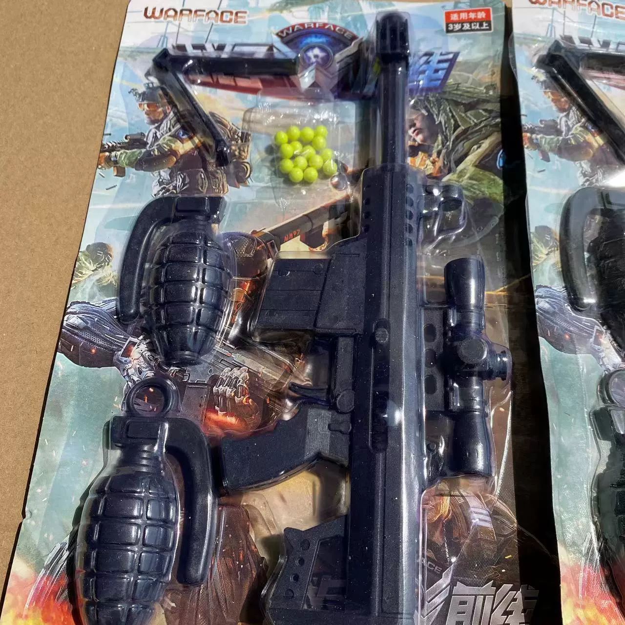 Juguetes infantiles pistolas de tarjeta de papel juguetes 2 yuanes al por mayor ventosa de plástico pistola de bala suave de dibujos animados estandos férula de tiendas departamentales al por mayor