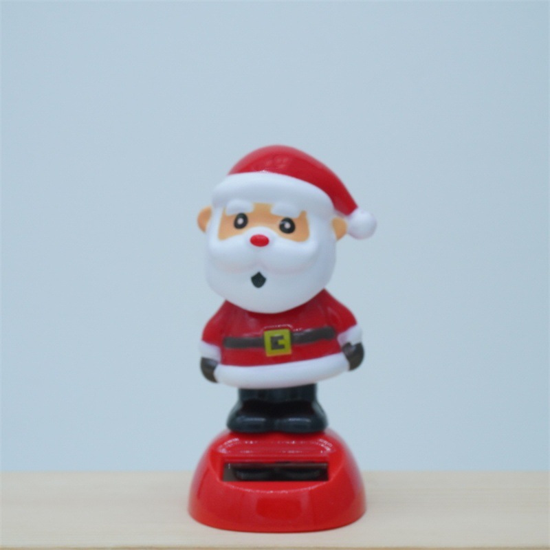 Cross-border Christmas solar energy automatic swing doll car interior shake head decorations creative car car ornaments