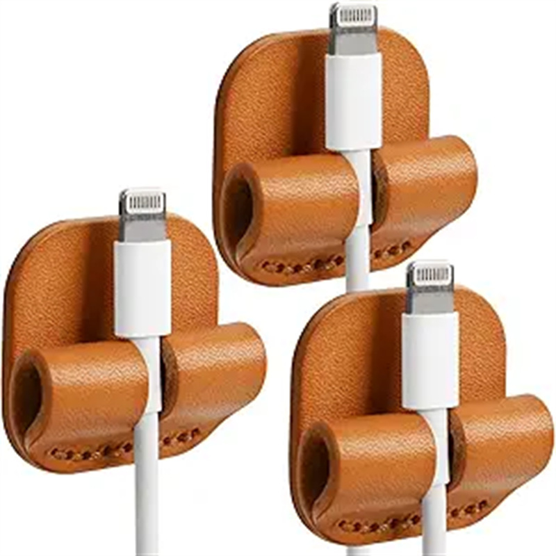 跨境热销线圈收纳整理器皮革桌面绕线器家用便携粘贴背胶线夹创意