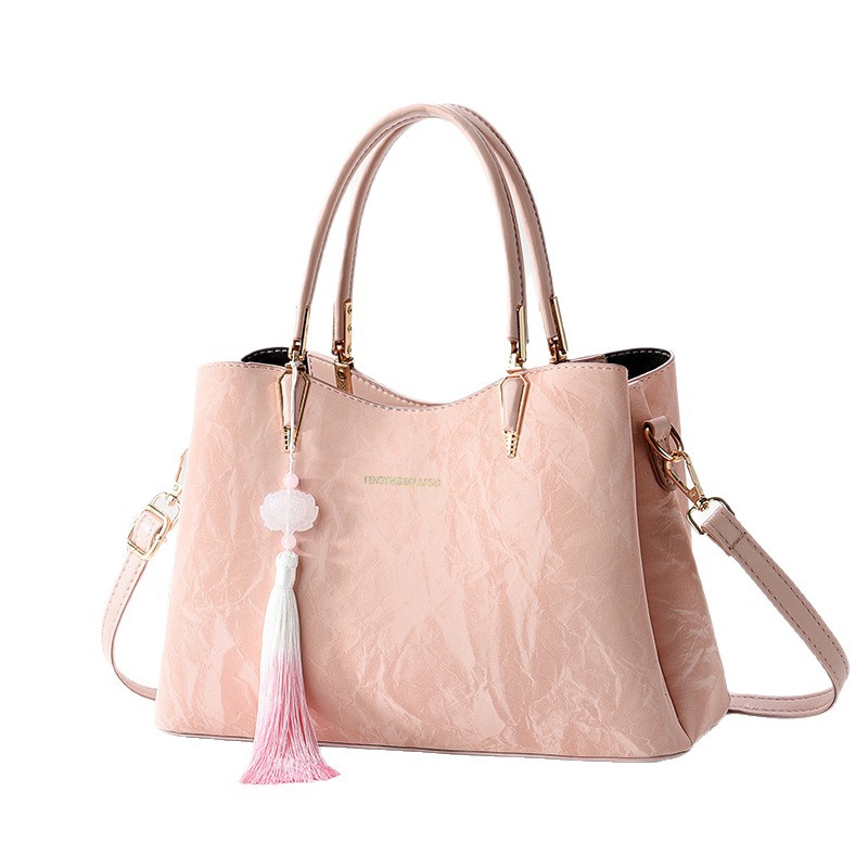 El nuevo estilo chino de estilo chino 2024 nuevo bolso de mujer gran capacidad bolso de madre bolso de hombro bolso de mochila