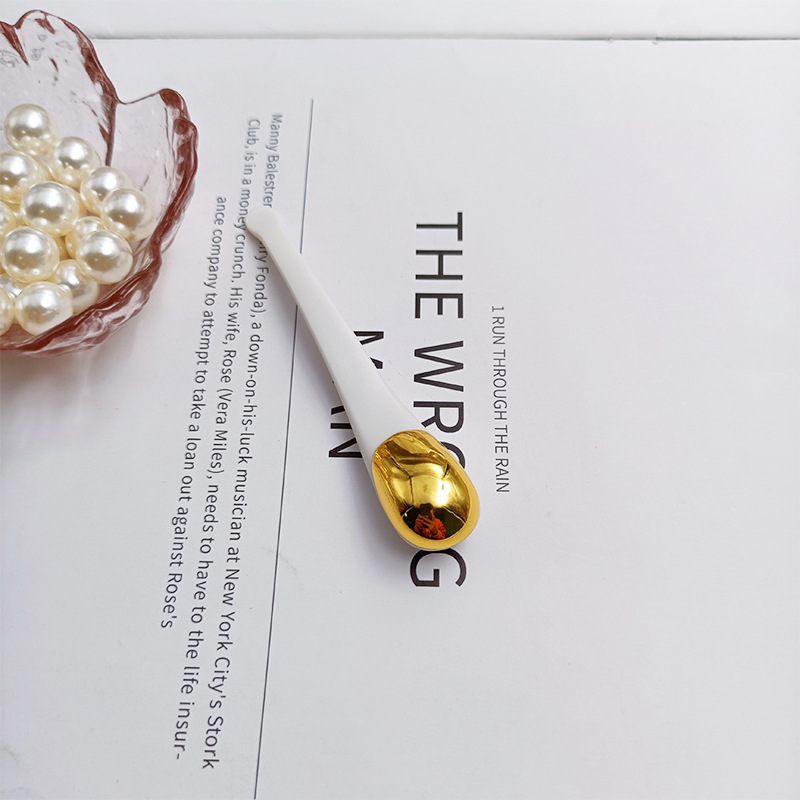 Nuevo stick tubular para crema de ojos y rostro, masajeador facial tipo cuchara, herramienta de belleza de importación