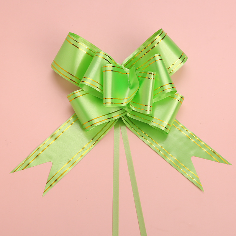 Borde dorado mano tire flor arco cinta regalo embalaje tire flor suministros de la sala de bodas boda decoración del coche de la boda tire Flor al por mayor