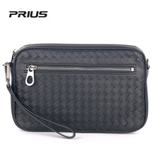 秋冬男士斜挎包打蜡皮编织男包休闲单肩包大容量手拿包一包两用