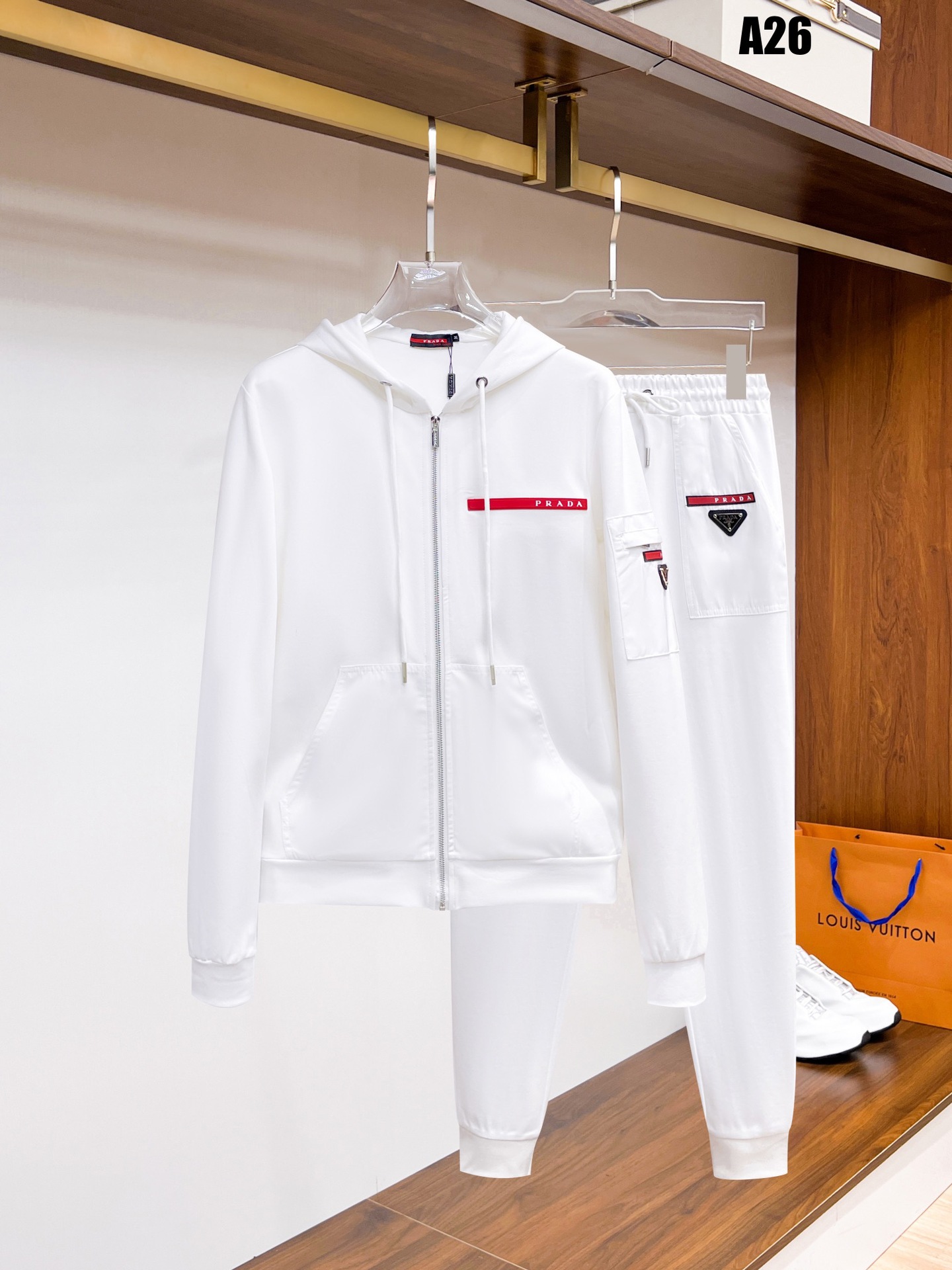 25 años de otoño y invierno de alta calidad nuevo estilo P casa marca de moda cardigan casual suéter deportivo conjunto de parejas