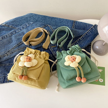 帆布斜挎包韩版百搭迷你抽绳水桶小包包女ins日系花朵可爱布袋包