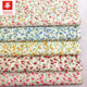 Supply cotton poplin printed small fresh white background small floral pastoral women's children's clothing fabric spot wholesale