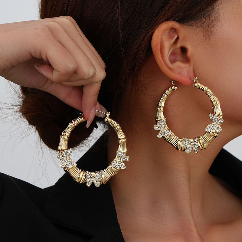 Mayorista Europa y América moda temperamento exagerado personalidad mariposa pendientes de diamantes círculo pendientes de orejas para mujeres