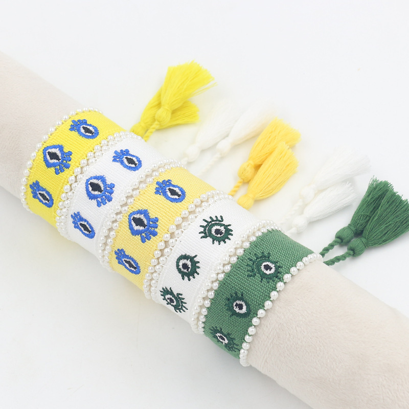 Cross-Border Jewelry Fashion Hand-Sewn Pearl Braided Wrist Strap Embroidered Eye Webbing Bracelet Tassel Bracelet Cross-Border Jewelry Fashion Hand-Sewn Pearl Braided Wrist Strap Embroidered Eye Webbing Bracelet Tassel Bracelet
