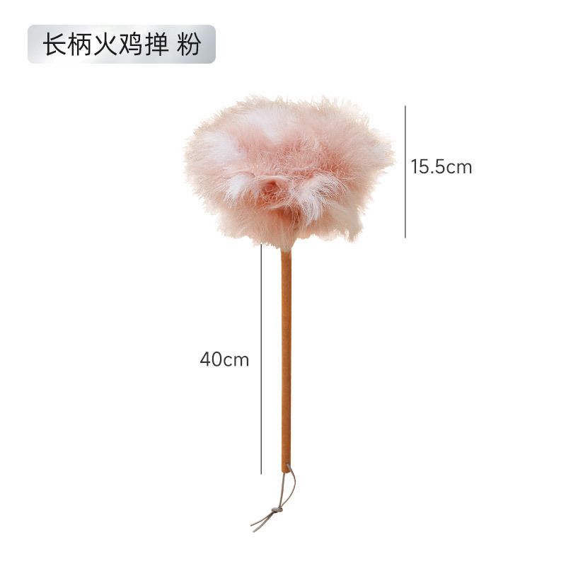 カラーの七面鳥の毛の毛のはたきのほこりを掃除します。家庭用の静電気の隙間をきれいにします。|undefined