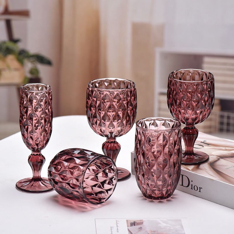 Glass engrosado color relieve taza de tinta fabricantes al por mayor taza de vino alto pie taza de vino casero taza de jugo