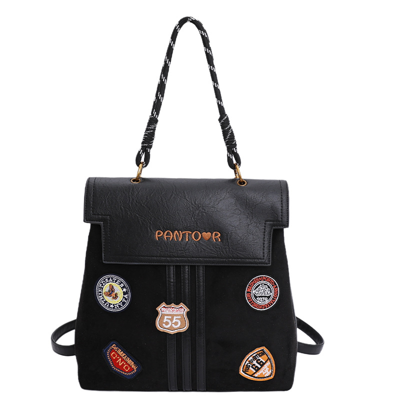 Comercio exterior insignia transfronteriza clase universidad mochila de viaje de la escuela de moda mejora la sensación de calidad retro mochila de gran capacidad