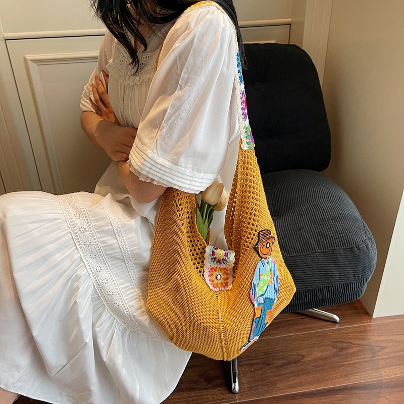 Versión coreana del bolso de nicho 2025 verano nuevo bolso femenino bolso tejido perezoso bolso de hombro casual de gran capacidad