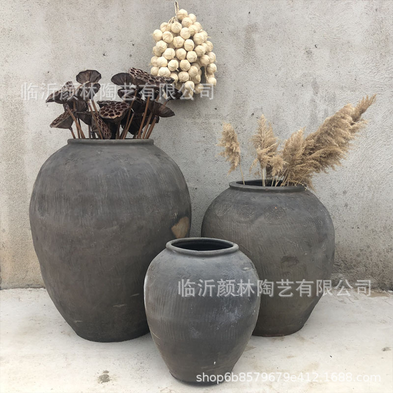 [Yan Lin] maceta de cerámica de tierra maceta de cerámica negra gran cilindro de agua de Weng paquete suave nuevo producto maceta de agua decoración popular