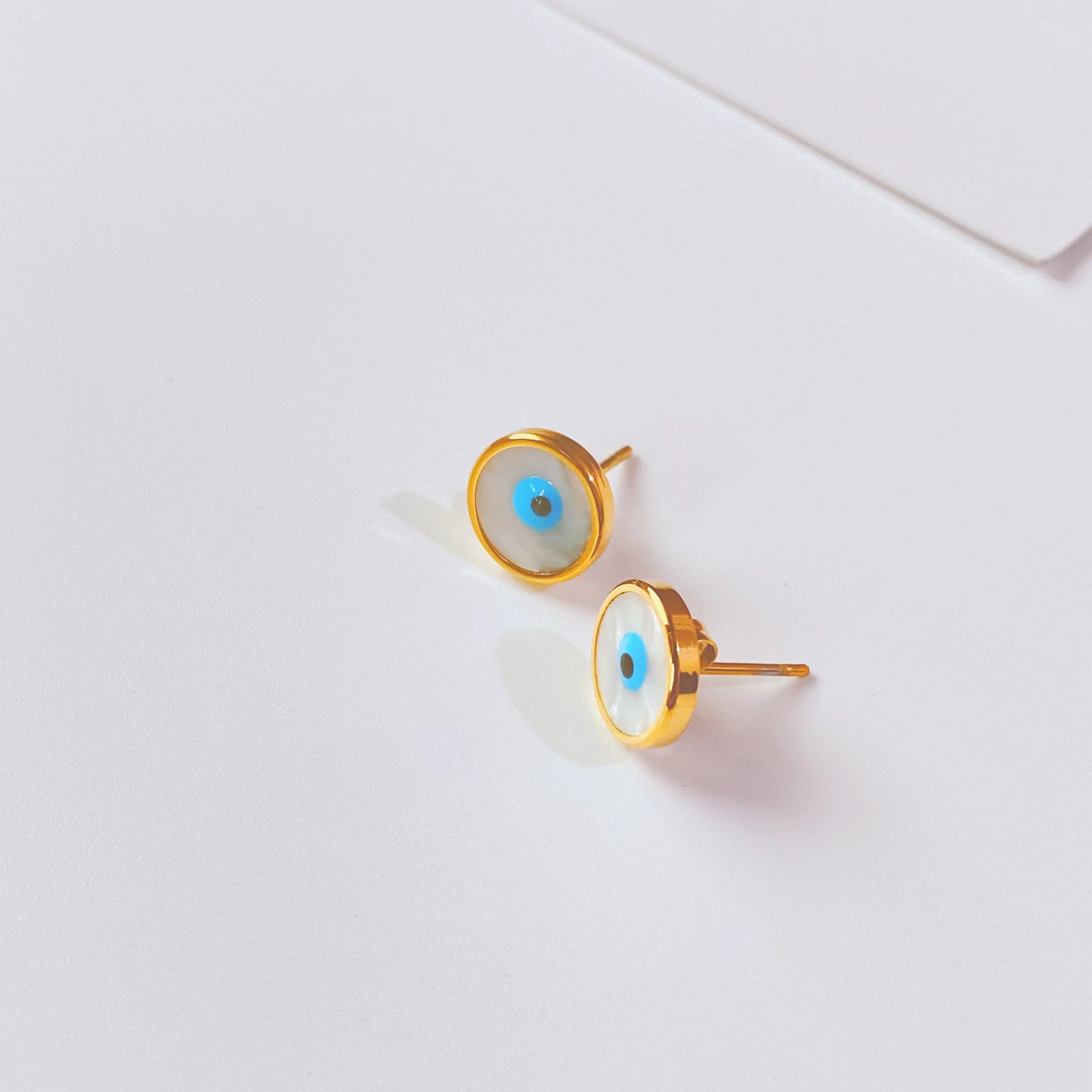 fashion trend new titanium steel gold simple eye shape earrings