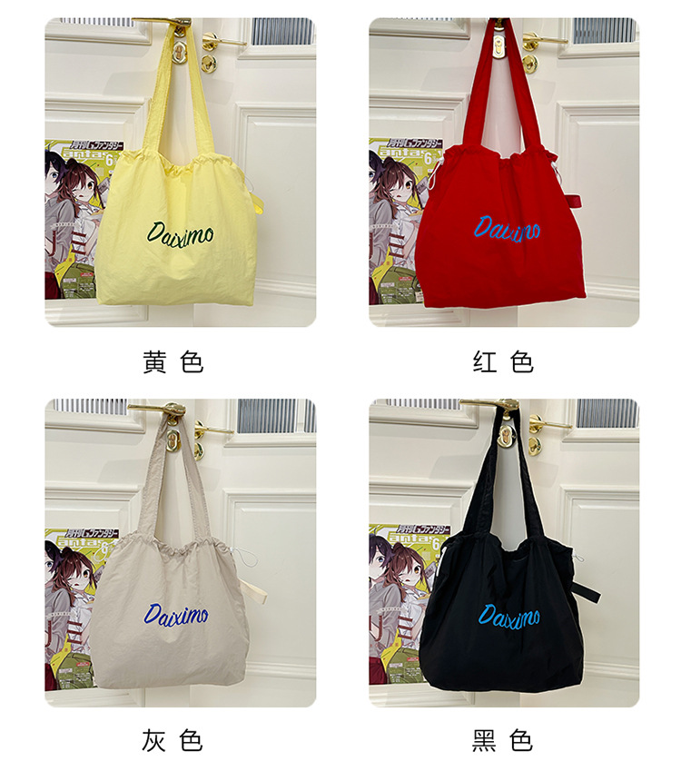 Solid color large-capacity tote bag 2025 bestseller, fashionable commuting lightweight handbag, laid-back style drawstring nylon bag for women Item Picture