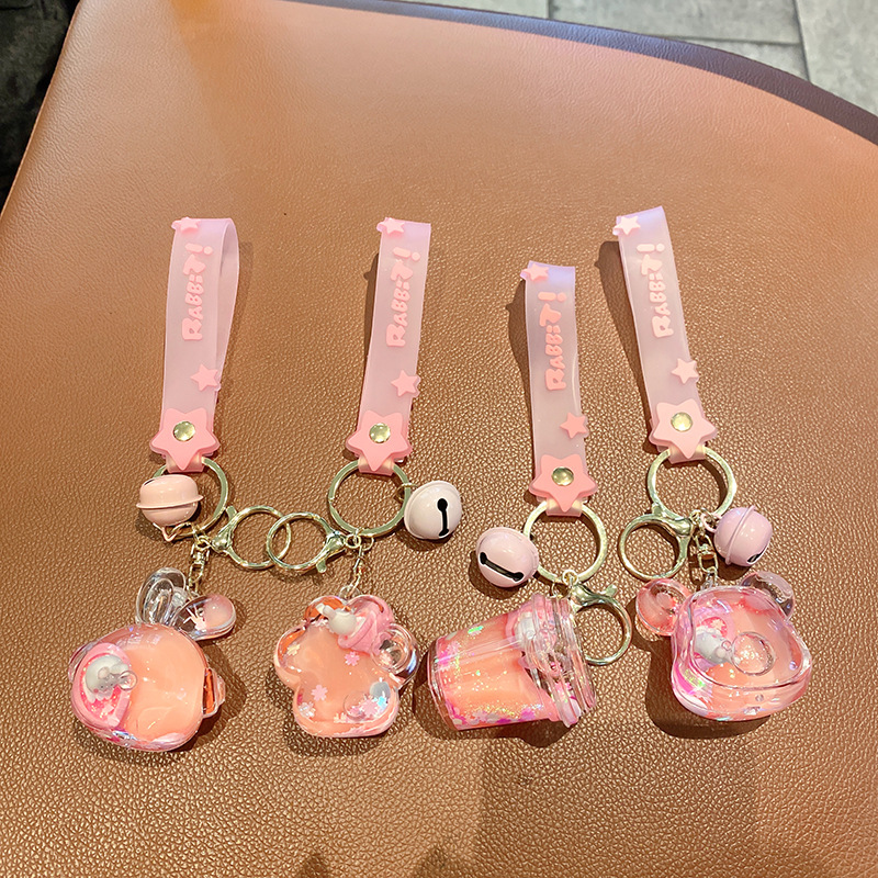 Linda bolsa de fresa de aceite llavero de conejo exquisito colgante de botella de deriva colgante de bolsa de coche colgante pequeño regalo al por mayor