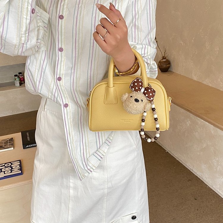 Bolsa de brazo retro nicho para mujeres 2026 nueva moda coreana bolsa de bolos portátil de gran capacidad bolso de hombro